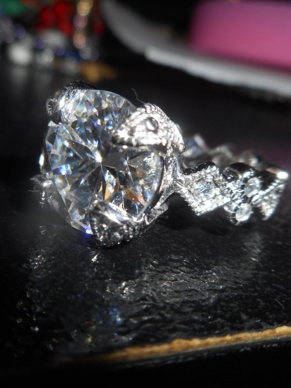 a beautiful & FANCY solitare ring - RING SIZE ABOUT 9 1/2